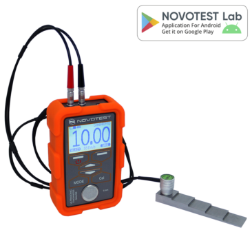 Ultrasonic Thickness Gauge NOVOTEST UT-1M - Alat ukur ketebalan ultrasonik portabel dengan layar digital dan probe.